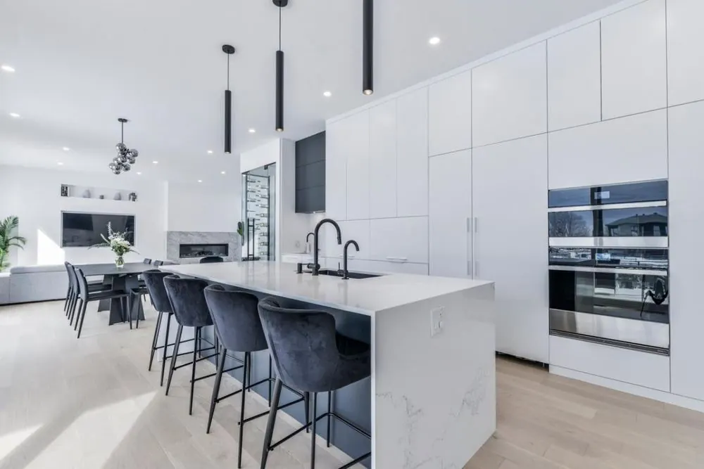 White kitchen open to the dining room